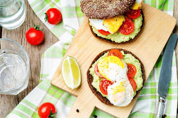 smashed avocado, tomatoes, egg sandwich