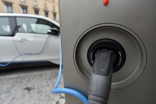 Charging an electric car with the power plug
