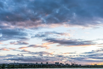 Evening city pond cloudscape view
