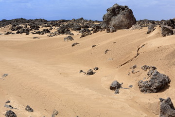 Fototapeta na wymiar Almost erased path in the desert. Danakil-Ethiopia. 0182