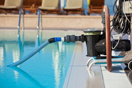 Cleaning Pump Working With A Swimming Pool