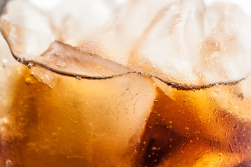 cola with ice cubes