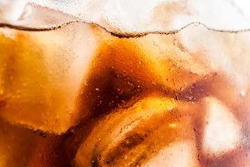 cola with ice cubes