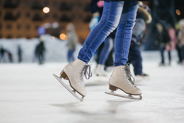 the girl on the figured skates - obrazy, fototapety, plakaty