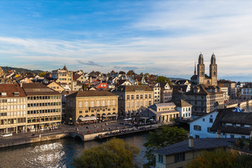 Fototapeta premium Aerial view of Zurich old town and Limmat river at dusk