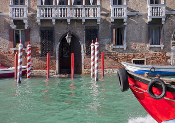 High water flooding antique palace in Venice Grand Canal