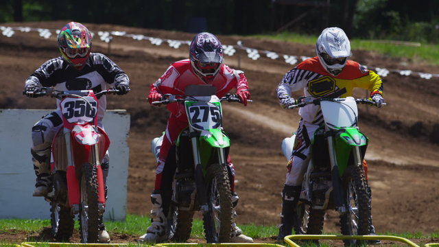 Motocross riders take off at start of race