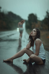 Woman suffering in the rain.