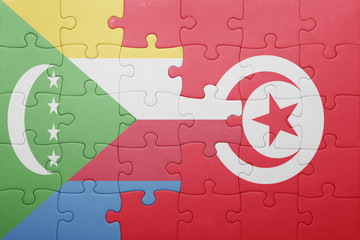 puzzle with the national flag of tunisia and comoros