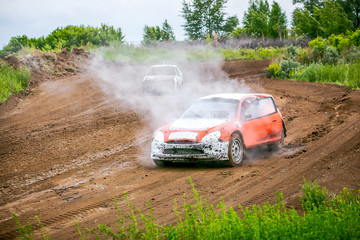 Obraz na płótnie Canvas Rally car in the cloud of smoke