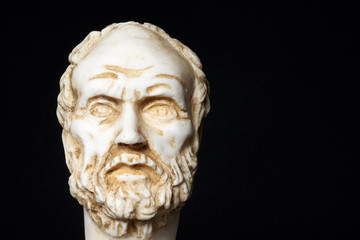 Fototapeta na wymiar White marble bust of the greek philosopher Democritus