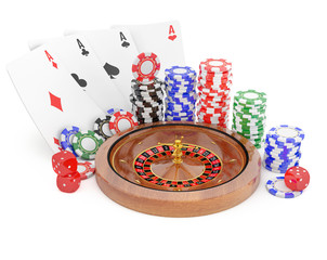 casino roulette wheel, chips, dice and cards for poker isolated