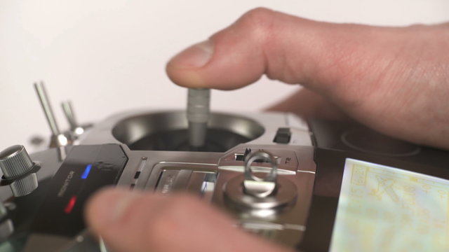 4 in 1 video! The man use the remote control for the drone. Real time capture