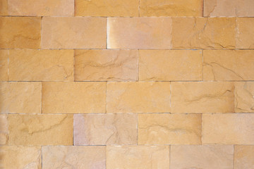Obraz premium Brown stone wall for background design.