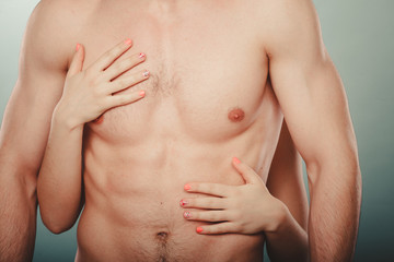 Fototapeta premium Sexy couple. Woman hands embracing naked man.