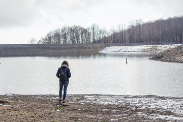 Woman looking a lake