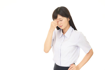 頭痛をうったえる女性