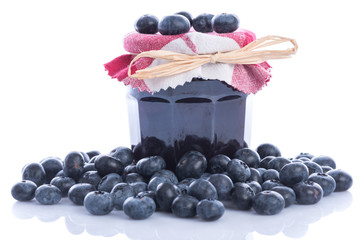 Blueberry jam jar with fresh blueberries