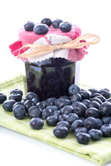 Blueberry jam jar with fresh blueberries