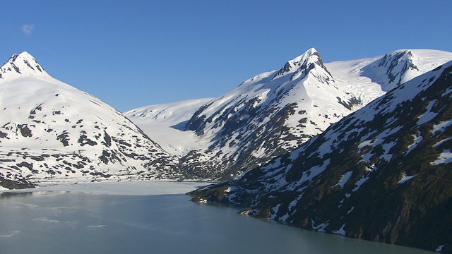 Aerial shot of glacier and mountain peaks, Alaska
