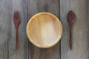 spoon,fork and wooden bowl.