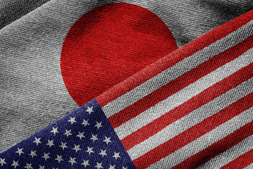 Flags of USA and Japan on Grunge Texture