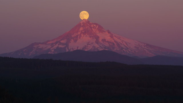 Aerial shot of full moon over Mt. Hood, Oregon