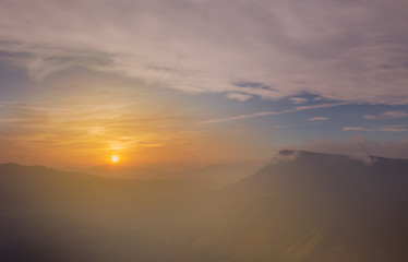 Colorful sunset on top of thailand mountain