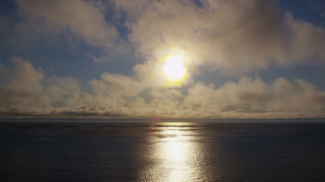 Sun and clouds over Pacific Ocean, Oregon Coast