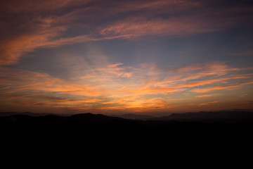 Obraz premium Colorful sunset on top of thailand mountain