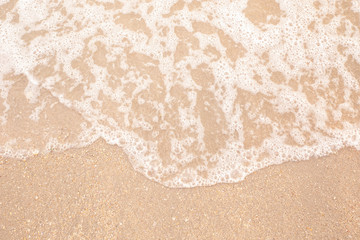 Soft wave of the sea on the sandy beach