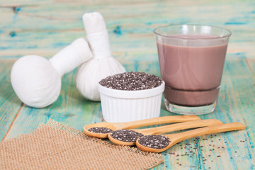 Chia seed with chocolate milk on wood table