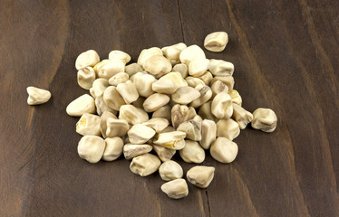 Cicerchia (Indian pea) on wooden background