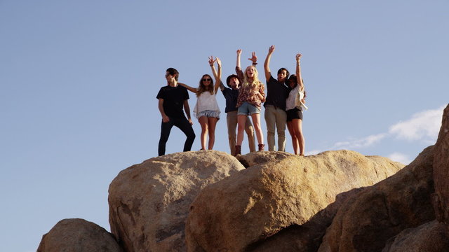 Friends on top of rock