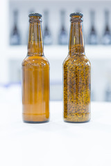 Wheat and beer in bottles