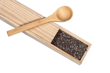 Nutritious chia seeds in wood box and wood spoon