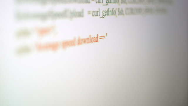 Typing PHP programming code on monitor. Shallow DOF 4k UHD (3840x2160)
