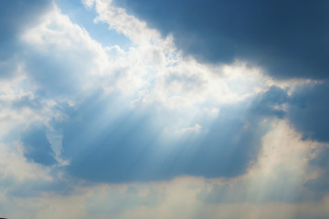 Fototapeta na wymiar Clouds with sunbeam
