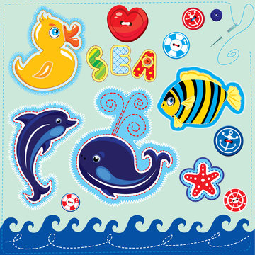 Set of buttons, cartoon animals and word SEA - hand made cutout