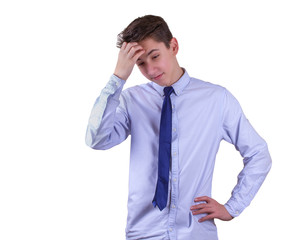 Teen boy doubting. Isolated on white