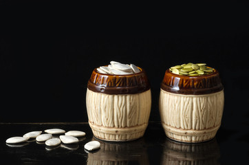 Pumpkin seeds on a black background