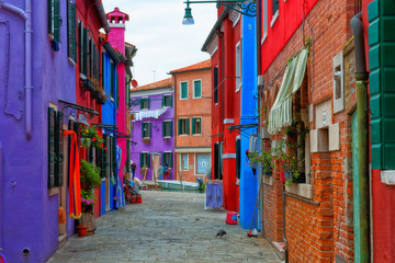 Fototapeta na wymiar Burano street with colorful houses, Italy
