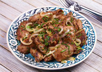 Sauteed chicken liver with apple and onion