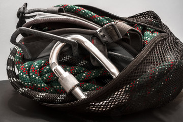Climbing equipment packed in a bag.