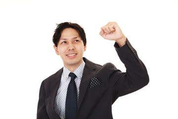 ガッツポーズのビジネスマン