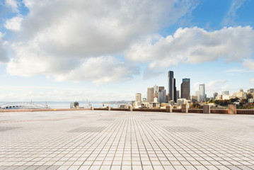 Fototapeta na wymiar empty marble floor with cityscape and skyline of seattle
