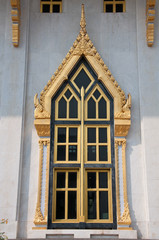 Gold historic window at temple.