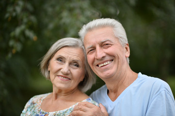 mature couple   in summer park