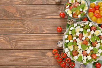 Vegetarian salad with cherry tomatoes, eggs and cheese