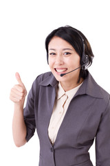 happy, smiling business woman showing thumb up gesture with head